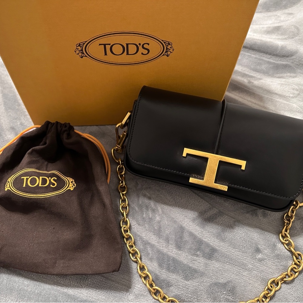 Tod's Black and Gold Crossbody Bag with Textured Leather and Gold Clasp